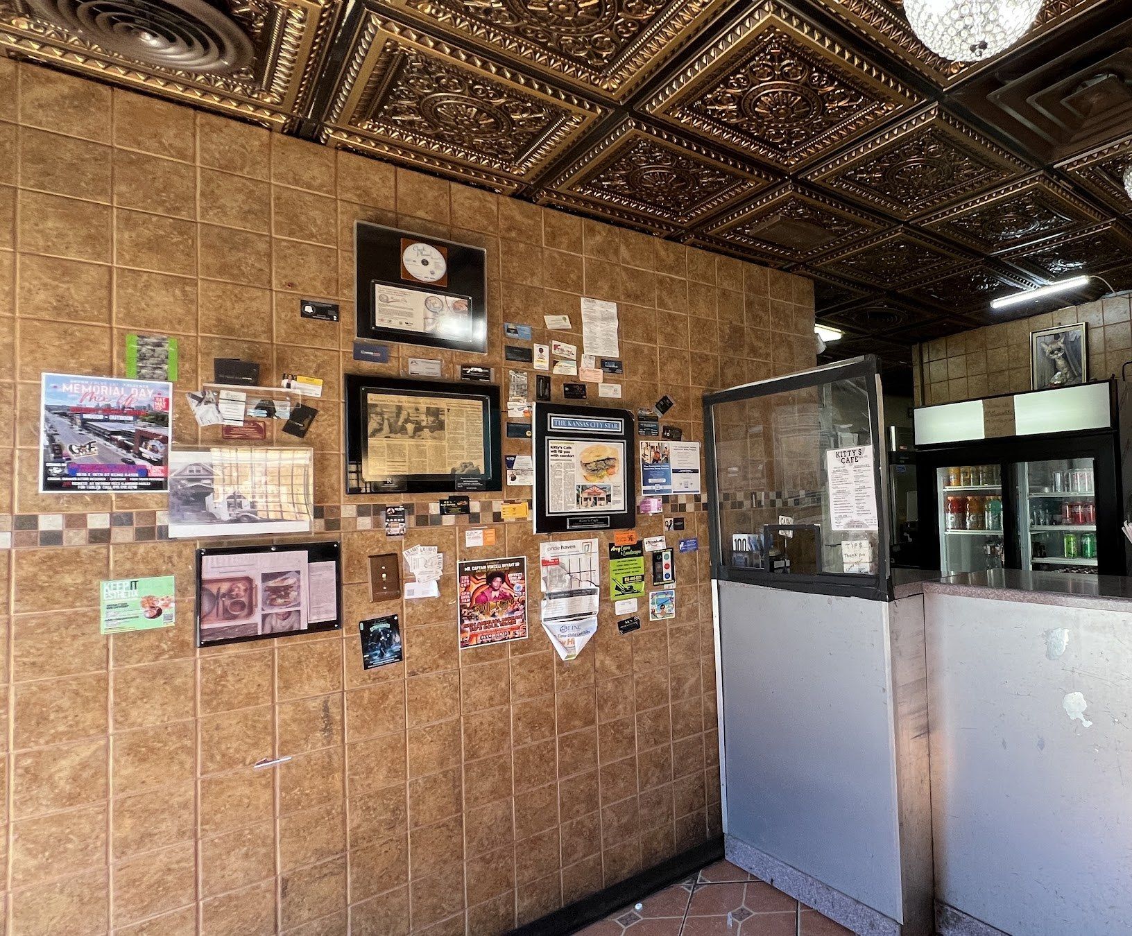 Inside, under the pressed tin ceiling